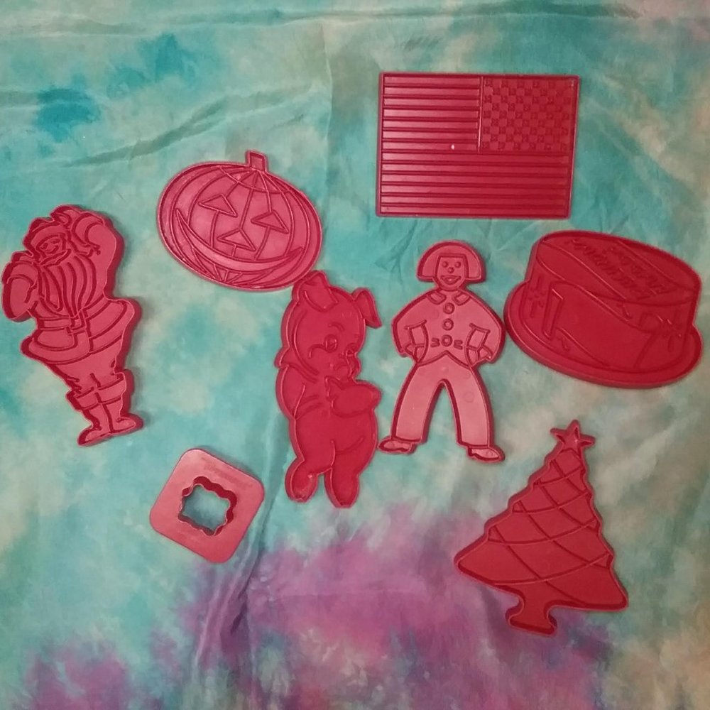 Eight Vintage Tupperware Cookie Cutters